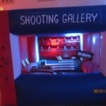CATERPILLAR RUN 30FT INFLATABLE| CORK SHOOTING GALLERY